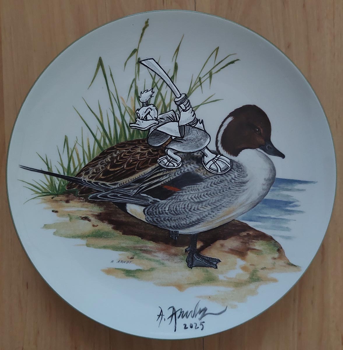 ANDREAS AMRHEIN 8 ANDREAS AMRHEIN Ente A 2025 Acryl auf Porzellanteller Durchmesser 195 cm